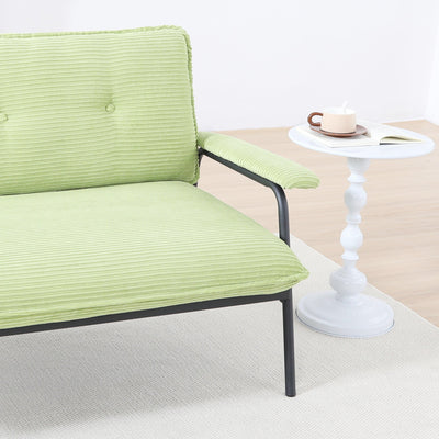 The 53-inch green sofa offers a spacious layout in the small apartment, easily handling various scenarios from watching movies to working