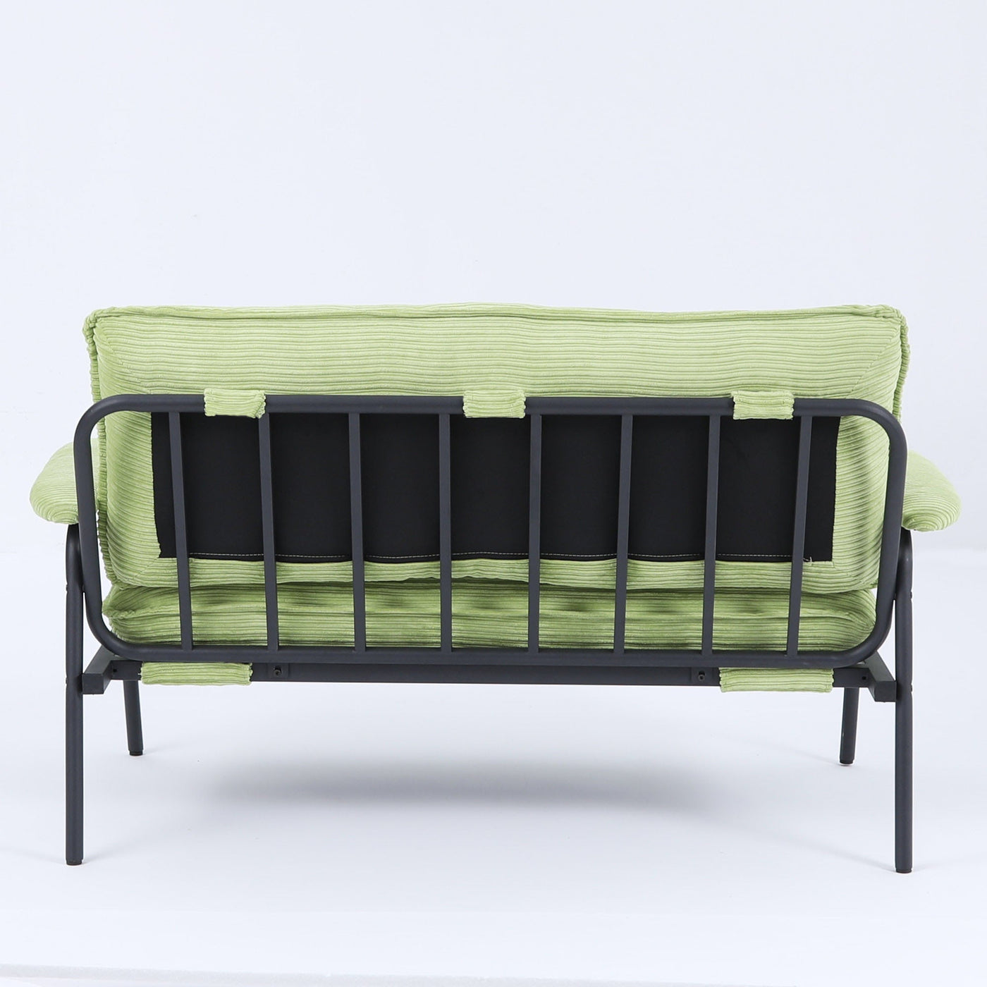 The 53-inch green sofa offers a spacious layout in the small apartment, easily handling various scenarios from watching movies to working