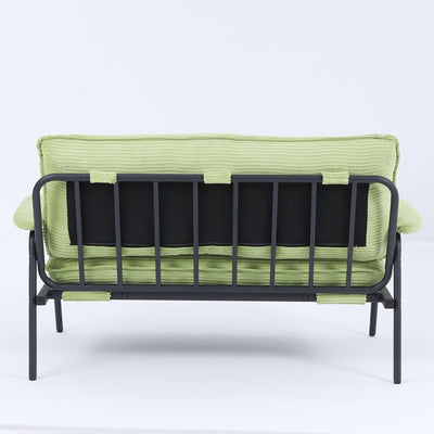 The 53-inch green sofa offers a spacious layout in the small apartment, easily handling various scenarios from watching movies to working