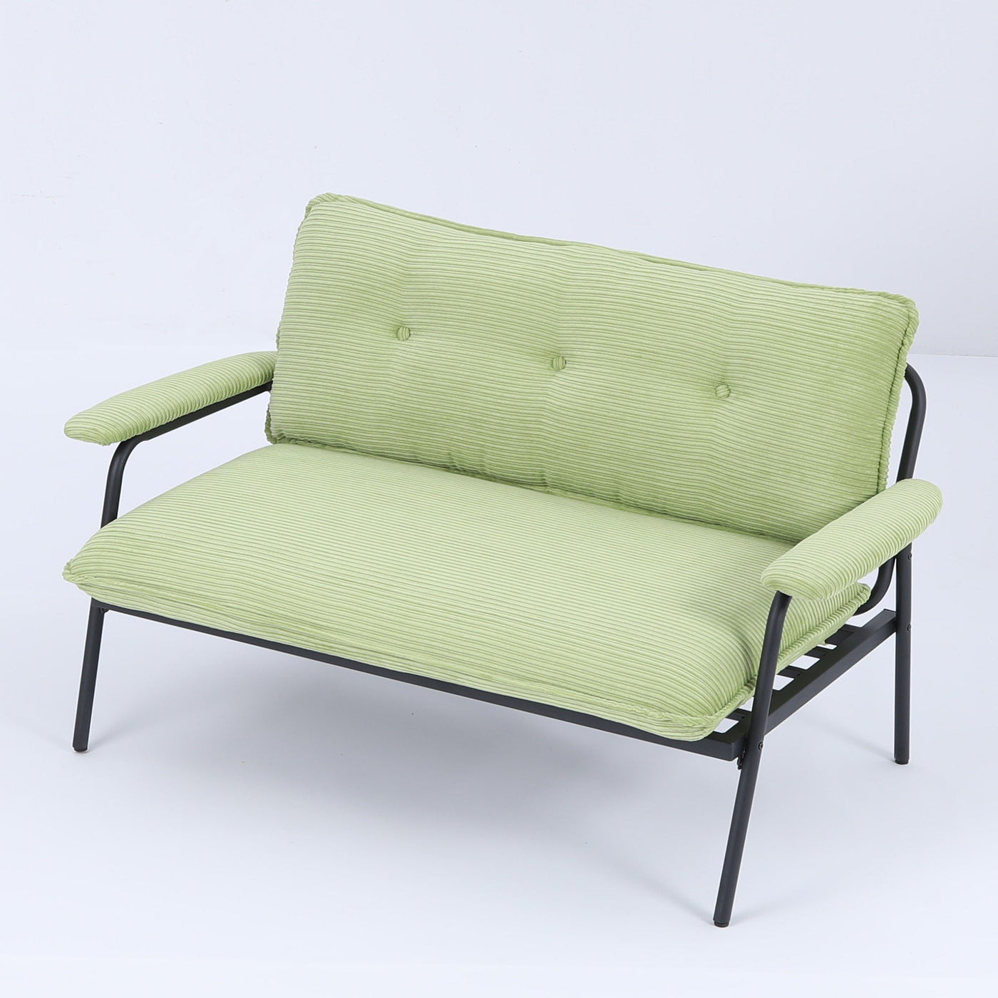 The 53-inch green sofa offers a spacious layout in the small apartment, easily handling various scenarios from watching movies to working