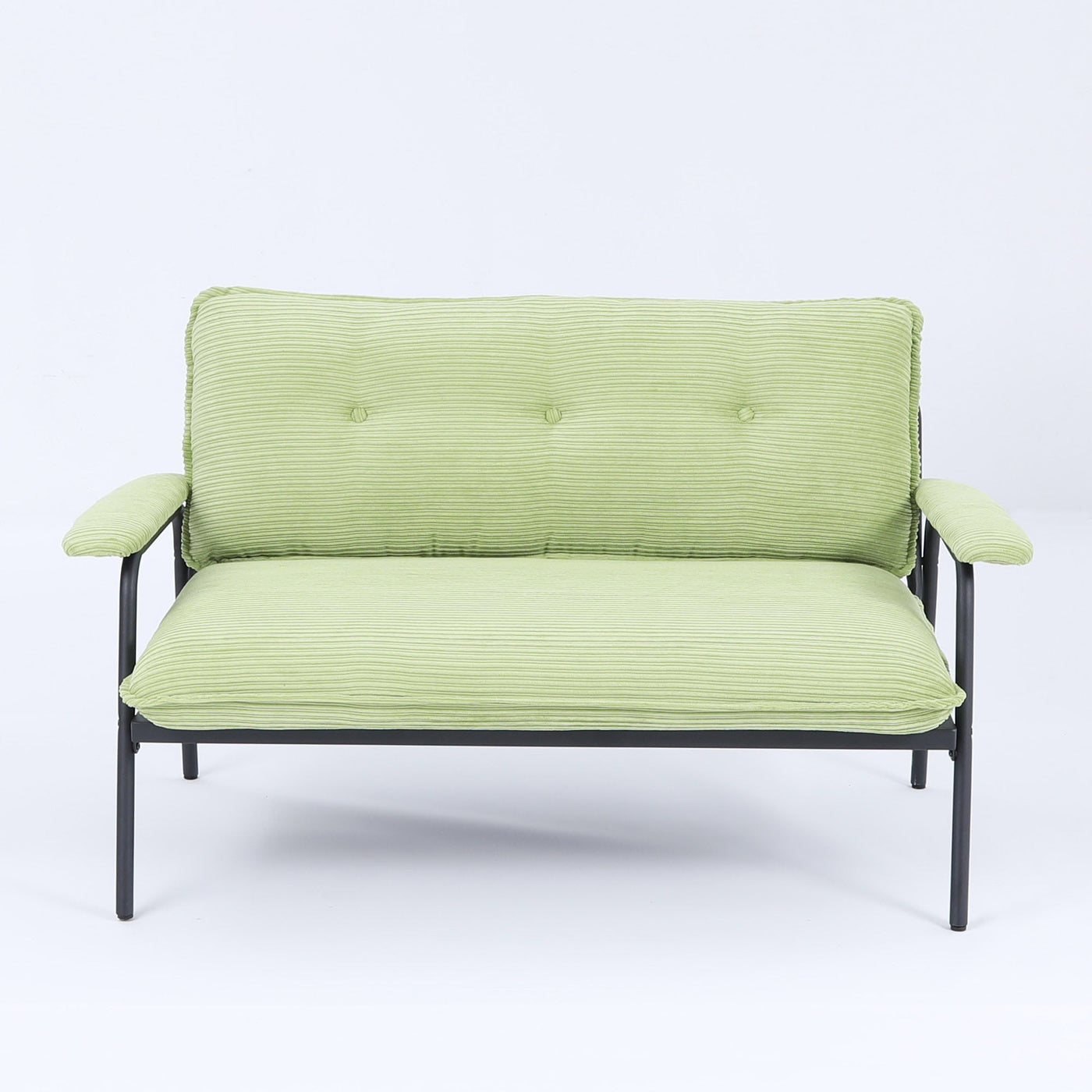 The 53-inch green sofa offers a spacious layout in the small apartment, easily handling various scenarios from watching movies to working