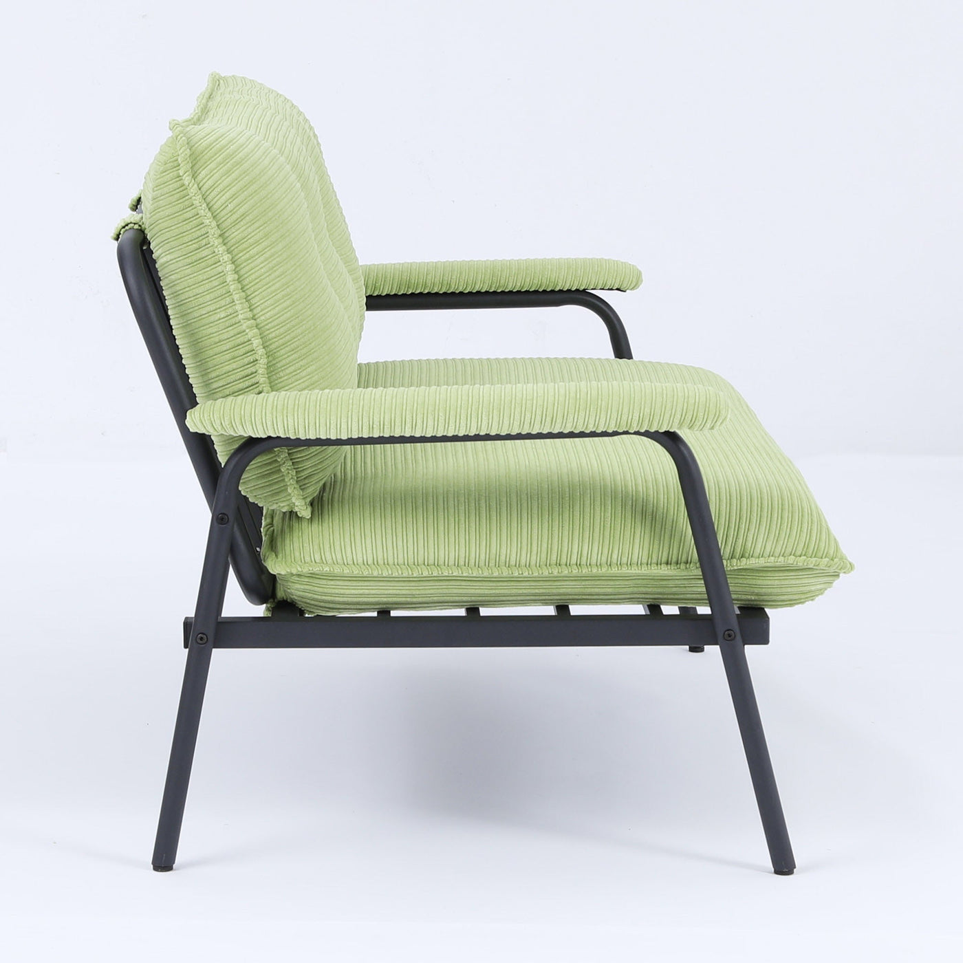 The 53-inch green sofa offers a spacious layout in the small apartment, easily handling various scenarios from watching movies to working