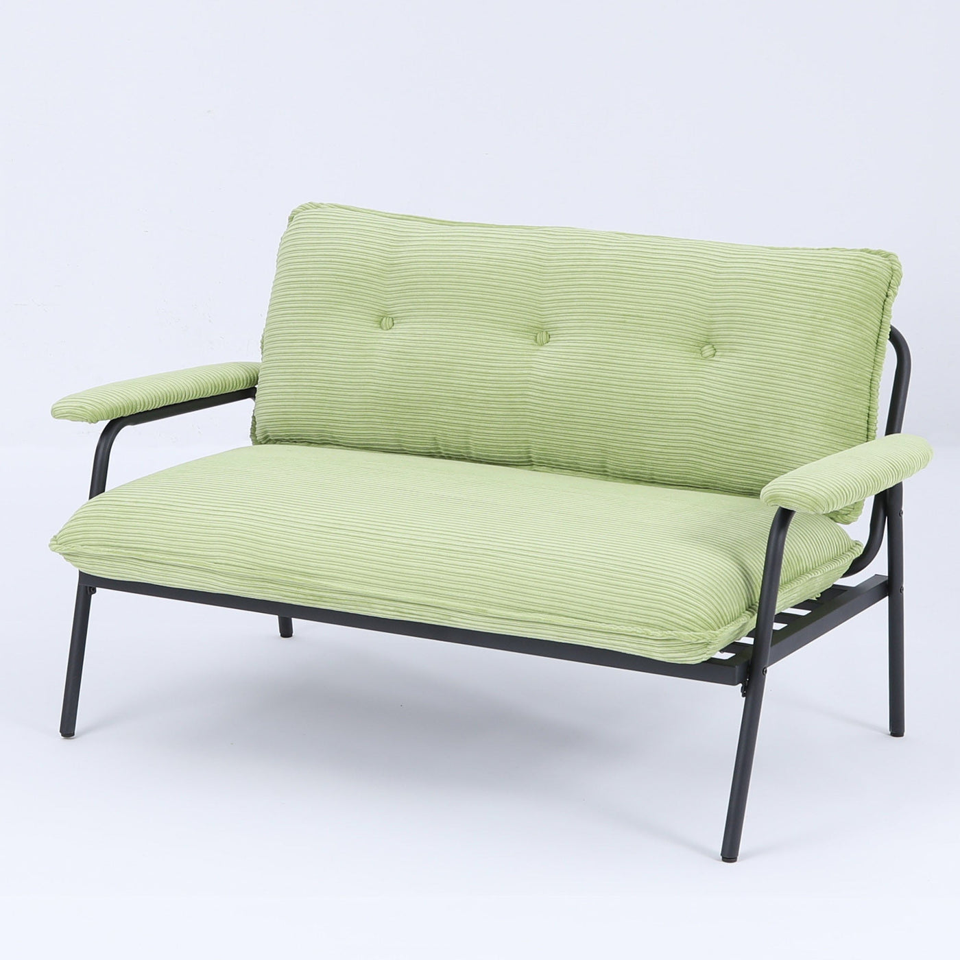 The 53-inch green sofa offers a spacious layout in the small apartment, easily handling various scenarios from watching movies to working