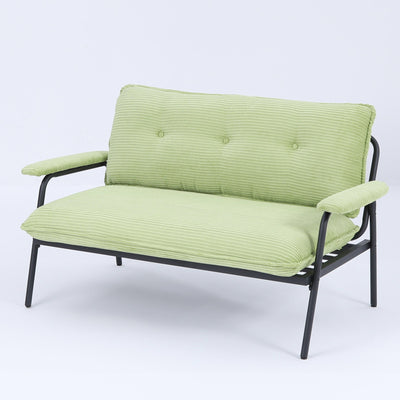 The 53-inch green sofa offers a spacious layout in the small apartment, easily handling various scenarios from watching movies to working