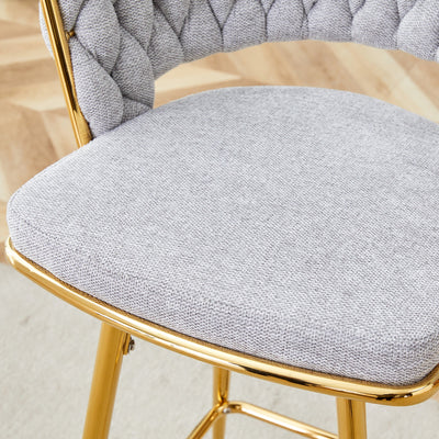 A set of 4 rotating bar stools, equipped with breathable linen cushions - beige seats with golden metal legs, suitable for the height of the kitchen island, dining table or bar counter